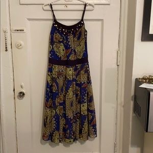 Midi dress, colorful beading and print.